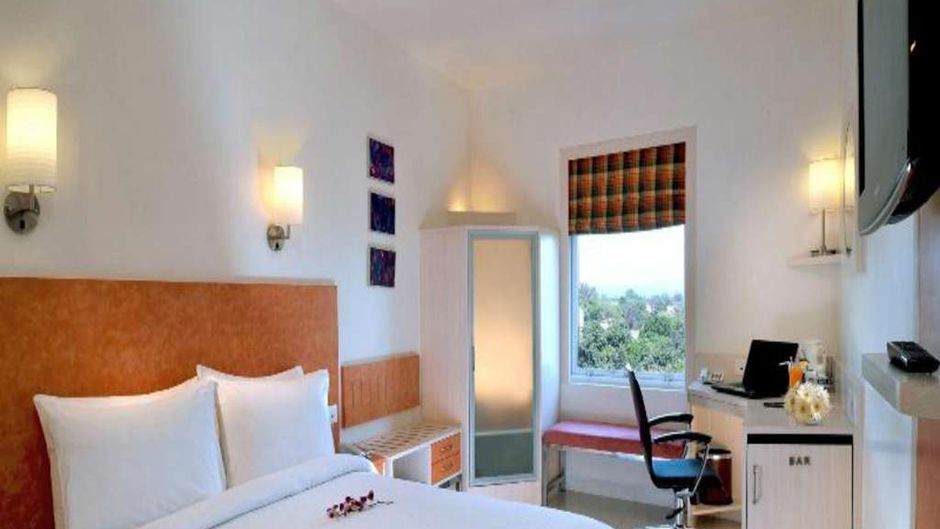 Kalyan Grand Hotel Room