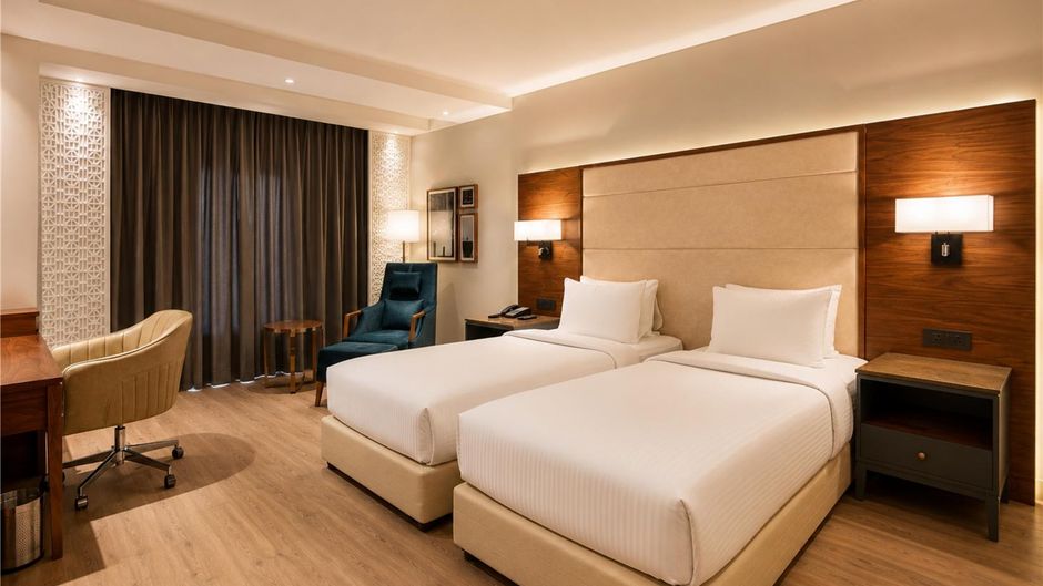 The Elite Narasapura Radisson Individual Room