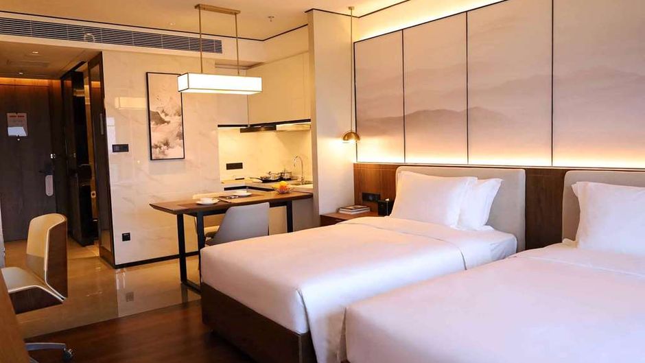Howard Johnson Optics Valley Residence Room