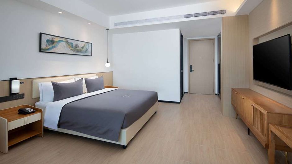Ramada Encore by Wyndham Jiusuo Downtown Room