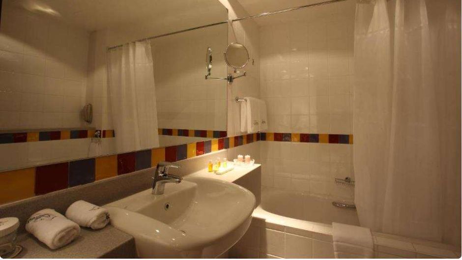 L'Arabia Hotel Apartments Room