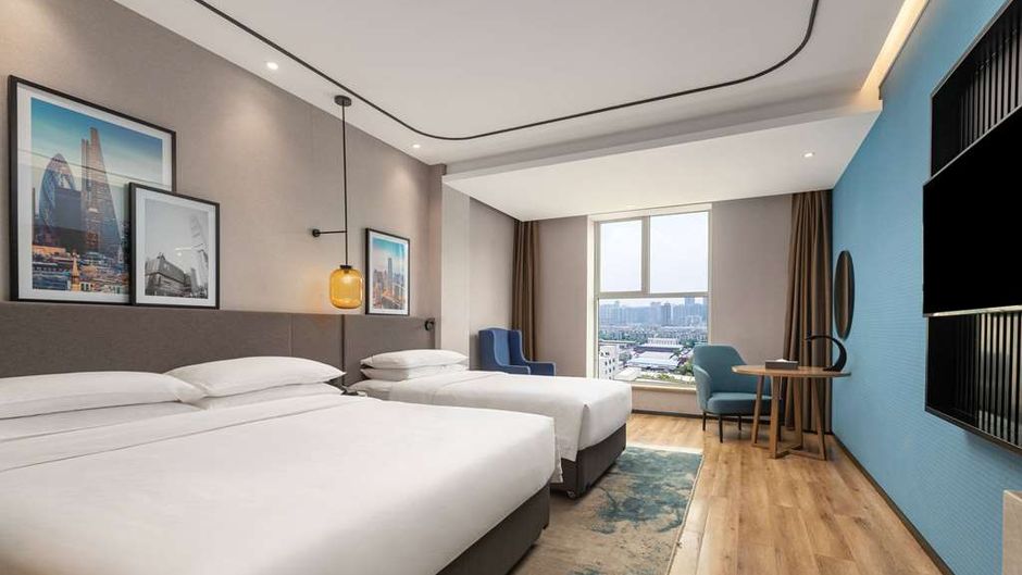 Ramada by Wyndham Financial Center Room