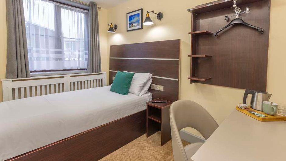 The Royal Hotel Room