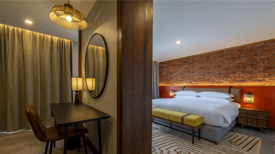 Zaria Court Hotel Hilton Room