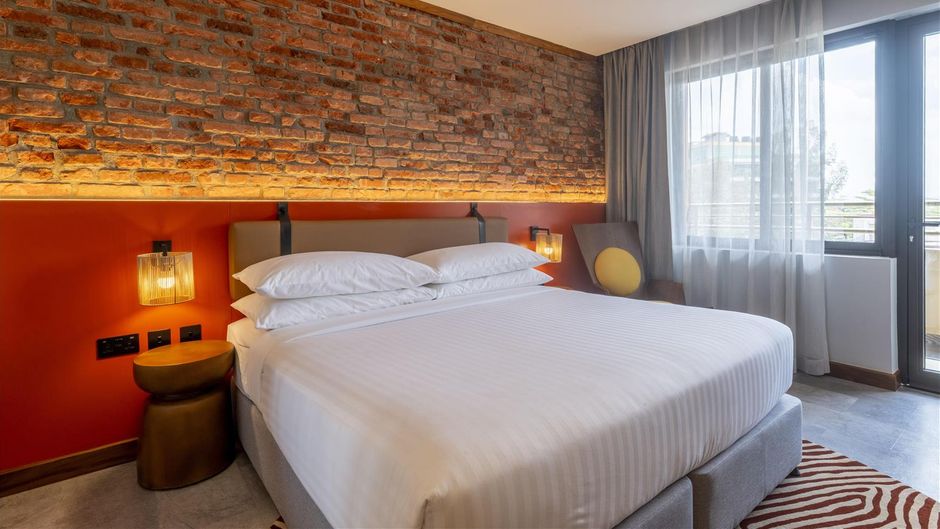 Zaria Court Hotel Hilton Room