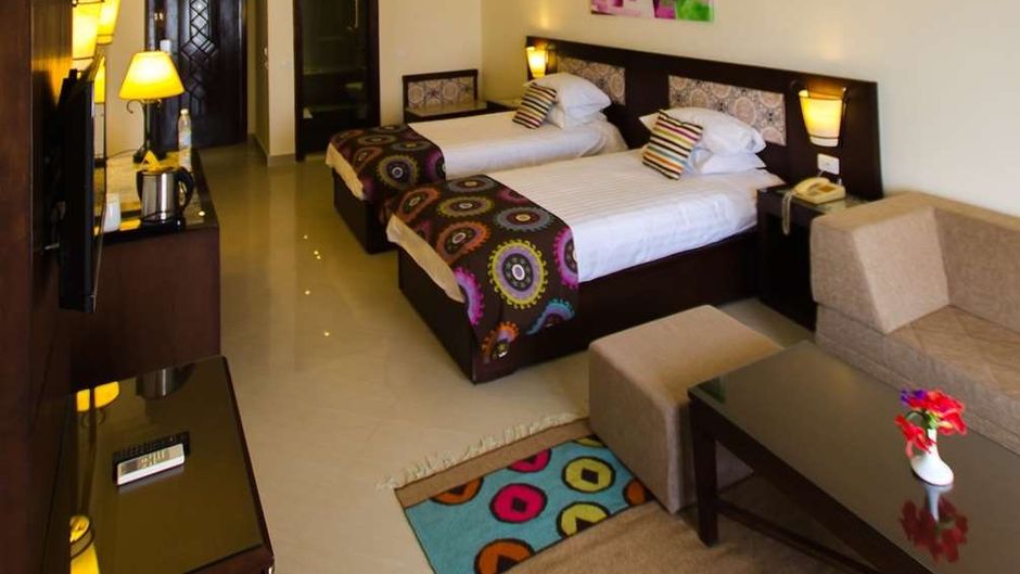 Lotus Bay Beach Resort & Gardens Room