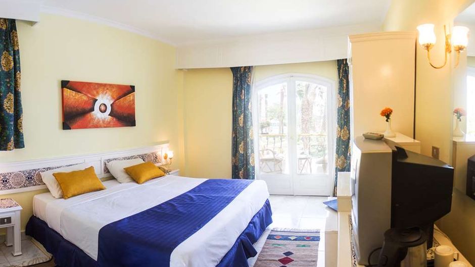 Lotus Bay Beach Resort & Gardens Room