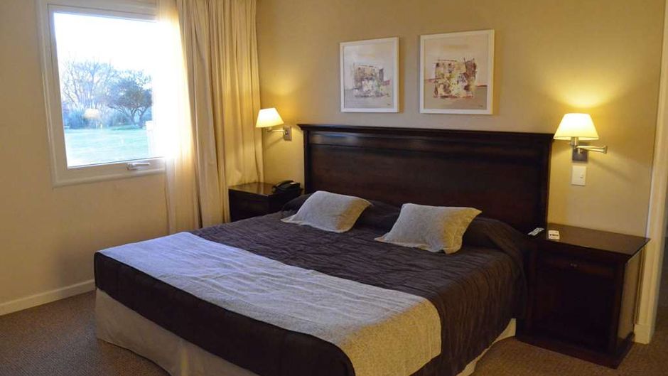 Howard Johnson Resort Villa de Merlo Room