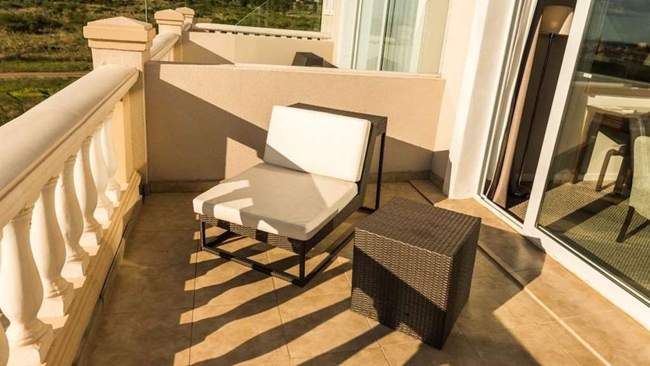 Howard Johnson Resort Villa de Merlo Room