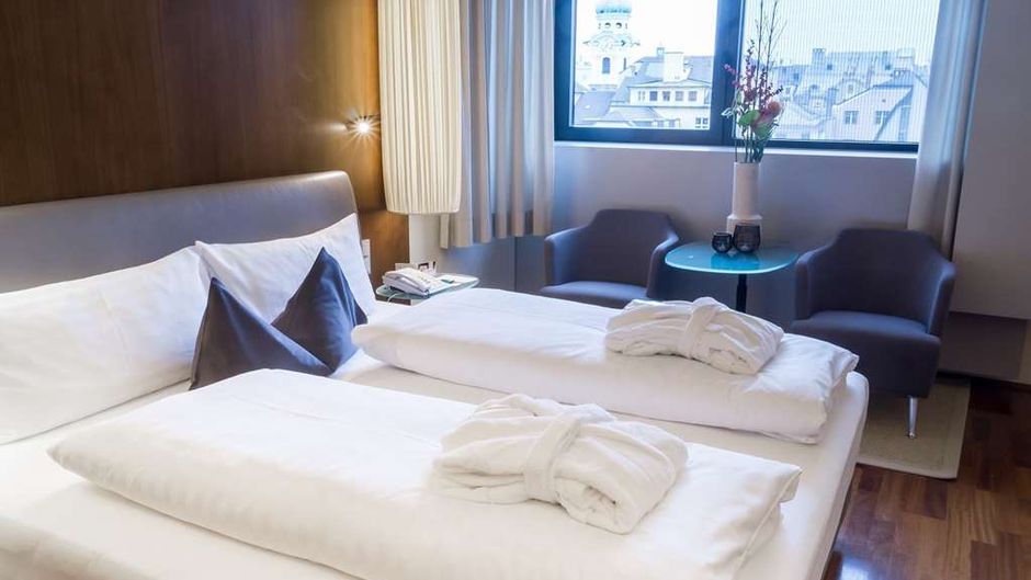 The Penz Hotel Room