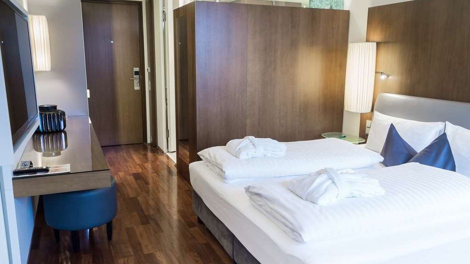 The Penz Hotel Room