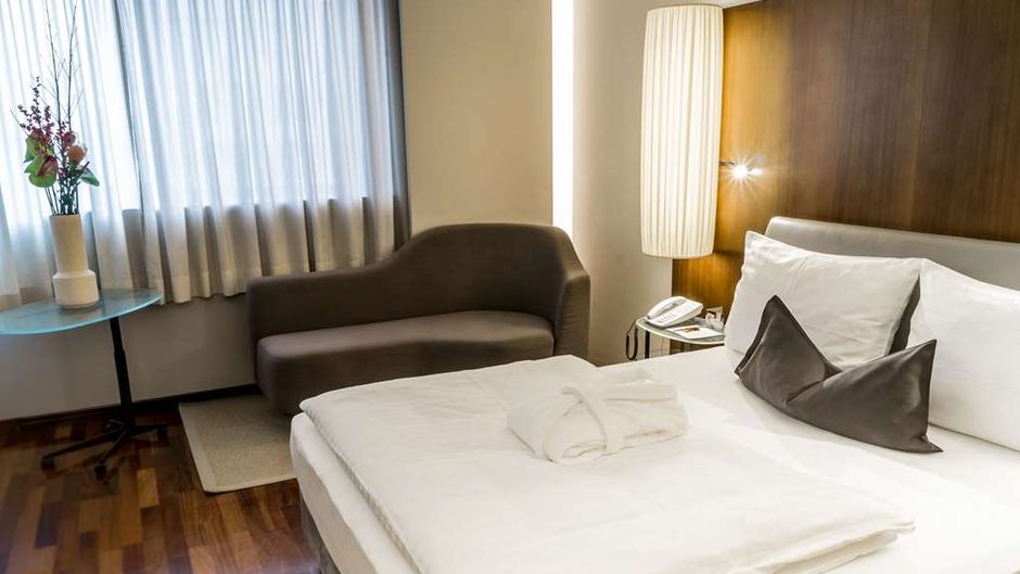 The Penz Hotel Room