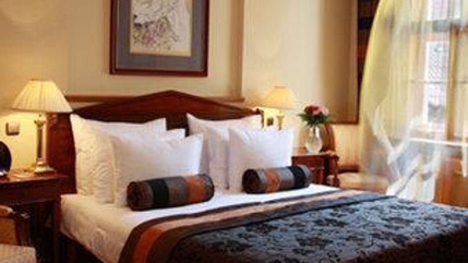 Golden Well Hotel Room