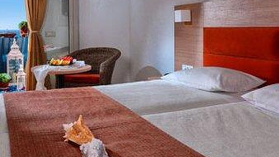 Sirens Beach Hotel Room