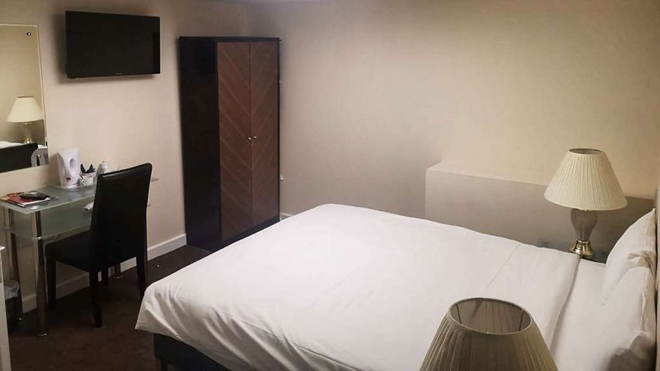 The Britannia International Hotel Room