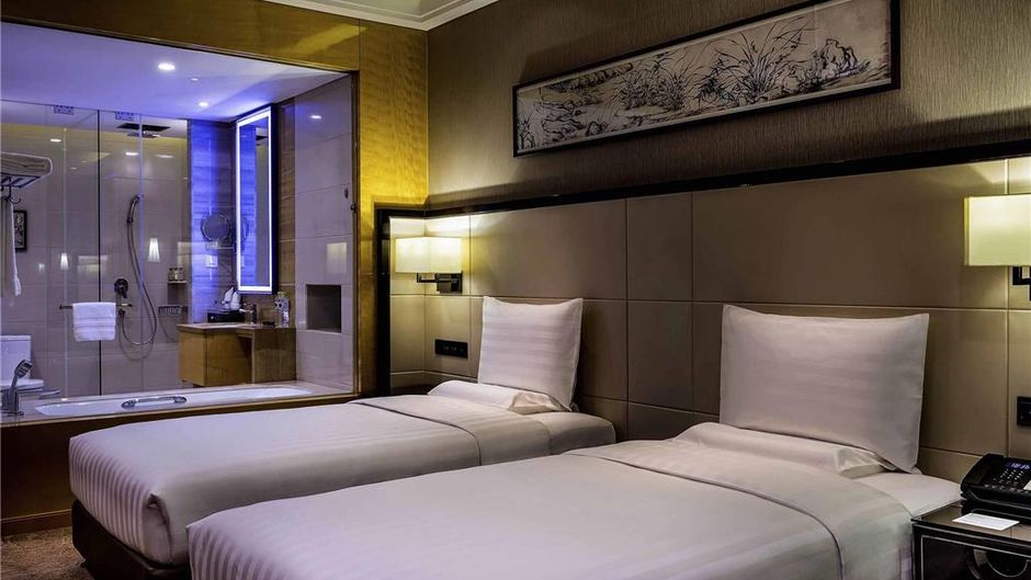 Pullman Qingdao Ziyue Hotel Room