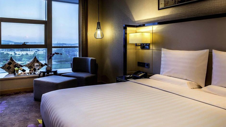Pullman Qingdao Ziyue Hotel Room