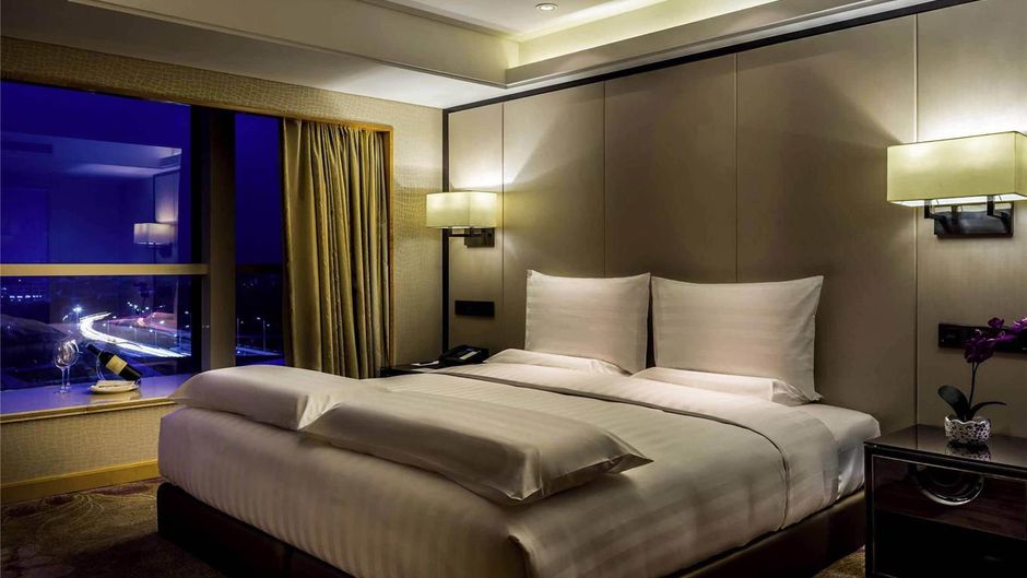 Pullman Qingdao Ziyue Hotel Room