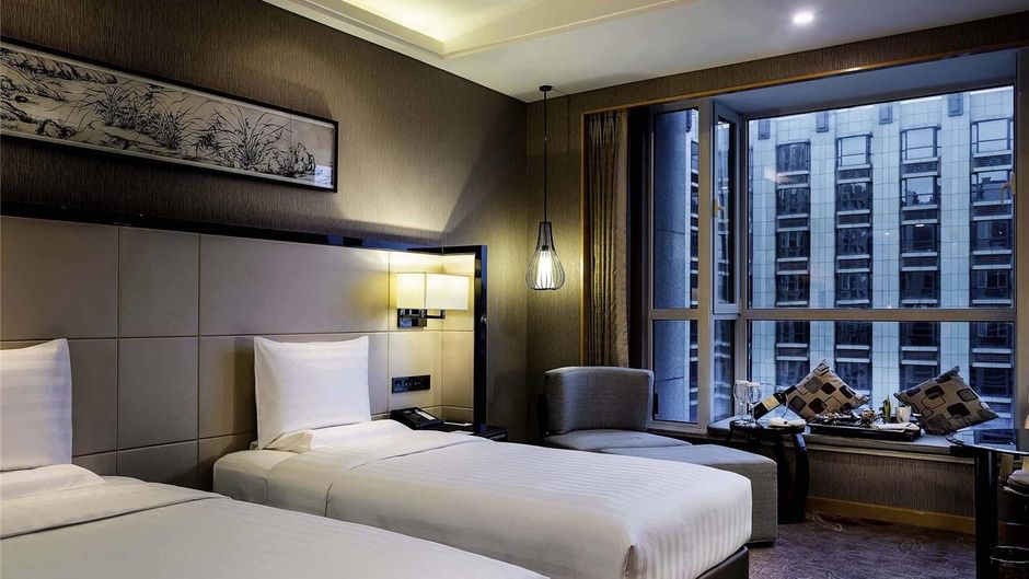 Pullman Qingdao Ziyue Hotel Room