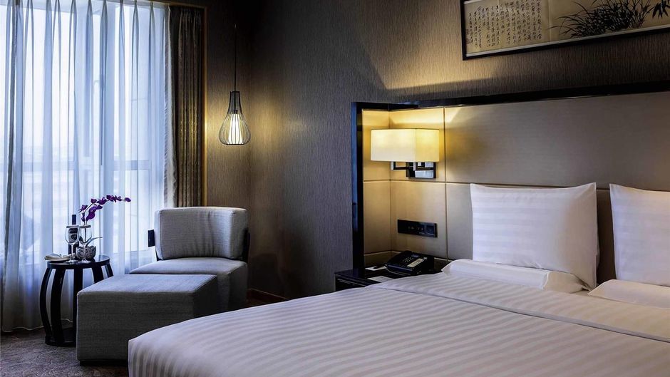 Pullman Qingdao Ziyue Hotel Room