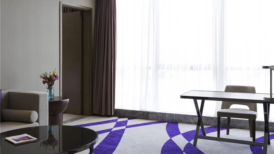 Novotel Rizhao Suning Hotel Room