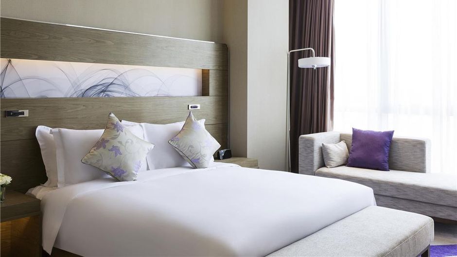Novotel Rizhao Suning Hotel Room