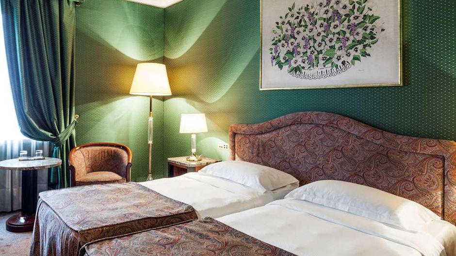 Adi Doria Grand Hotel Room