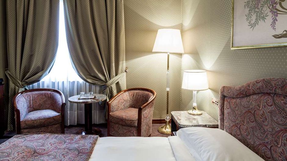 Adi Doria Grand Hotel Room