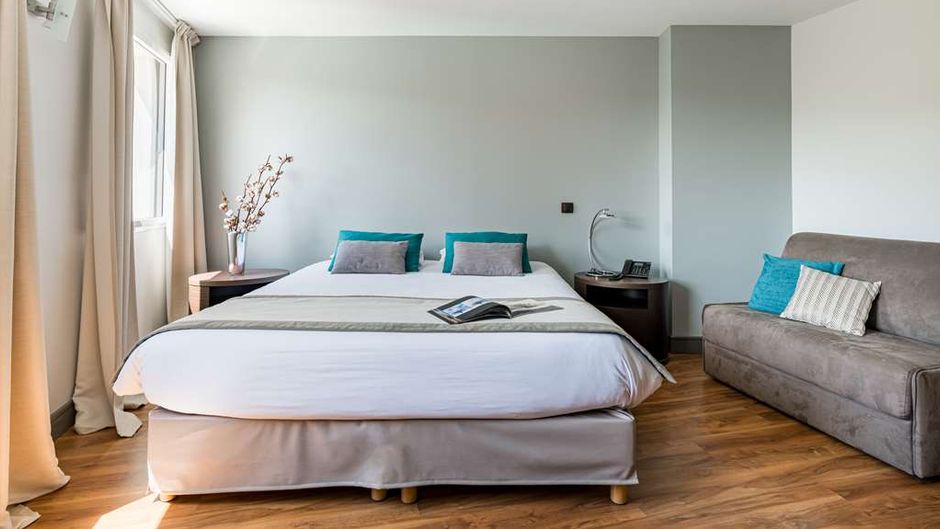 Le Place Neuve Room