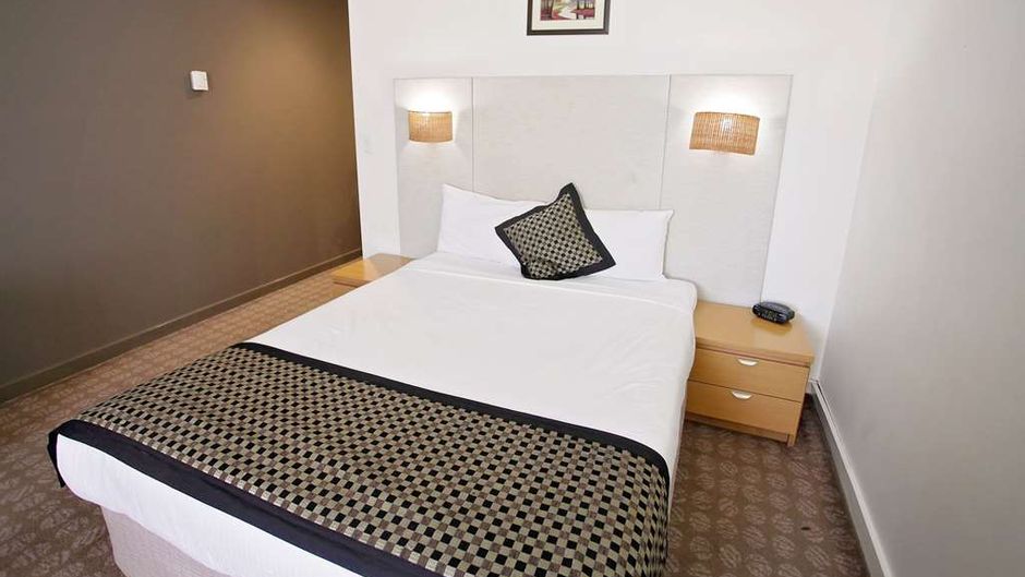 Golden Pebble Hotel Room