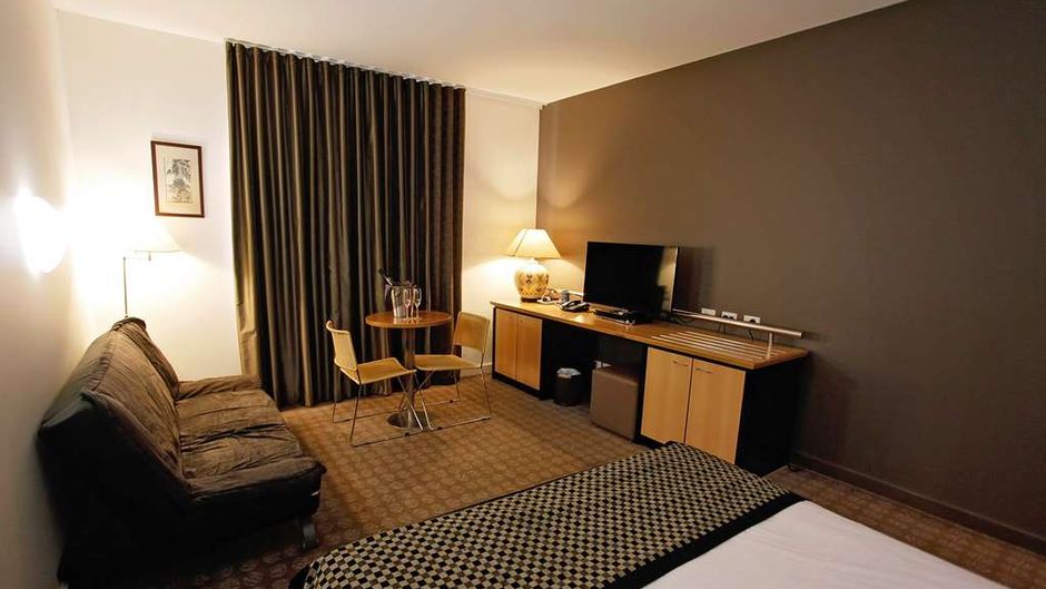 Golden Pebble Hotel Room