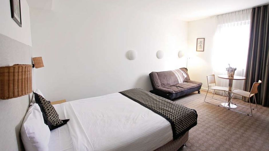 Golden Pebble Hotel Room