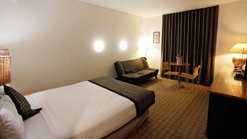 Golden Pebble Hotel Room