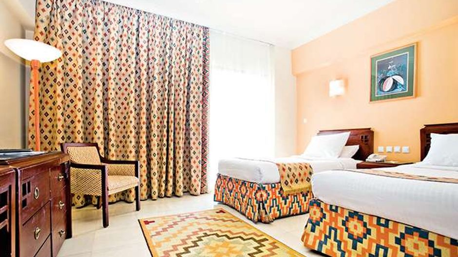 Sunrise Holidays Resort Room
