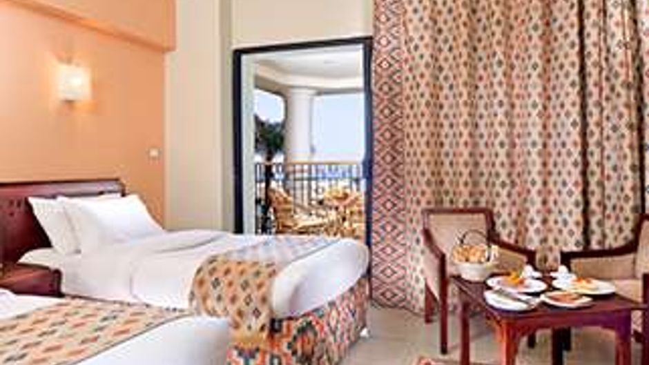 Sunrise Holidays Resort Room