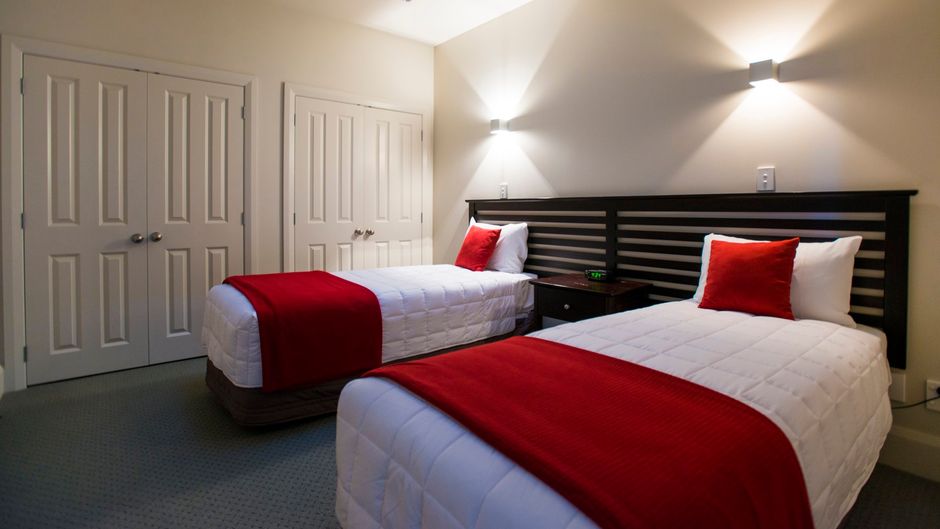 Emerald Hotel Room