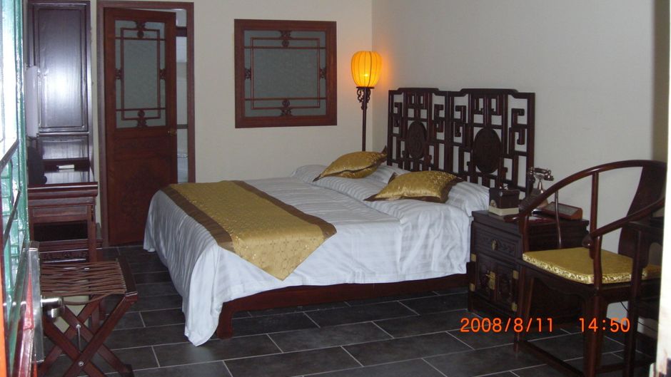 Soluxe Sunshine Courtyard Hotel Room