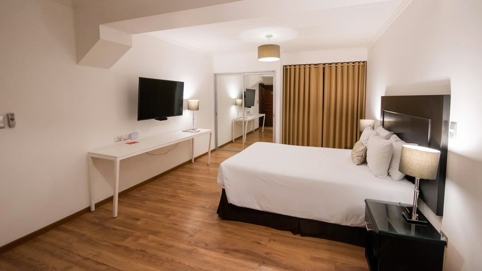 El Polo Aparthotel Room