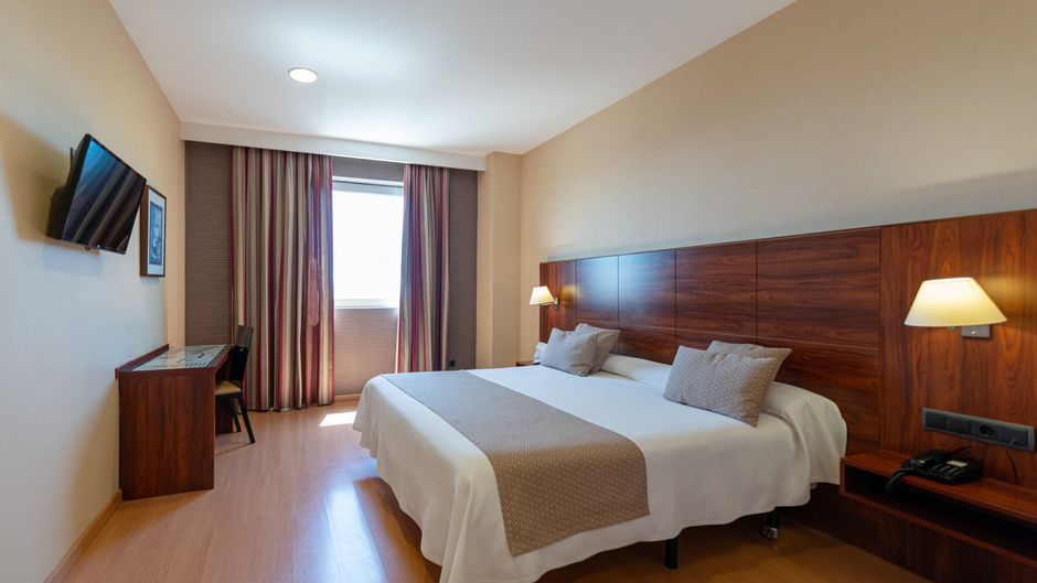 Sercotel Hotel Riscal Room
