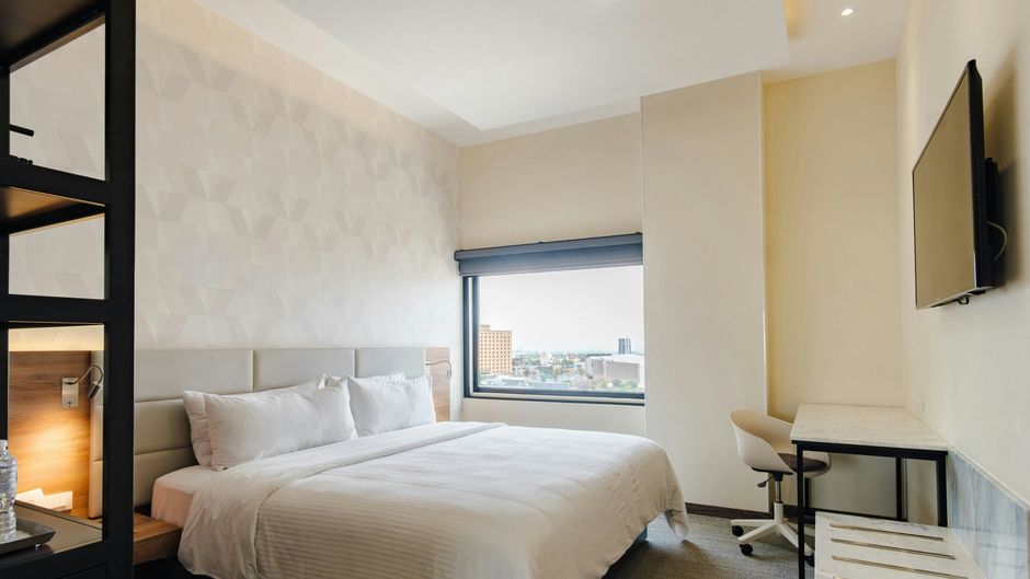 SJ Grand Hotel Room