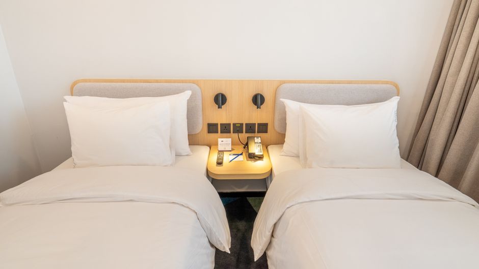 Holiday Inn Exp Suites Banjarmas Room
