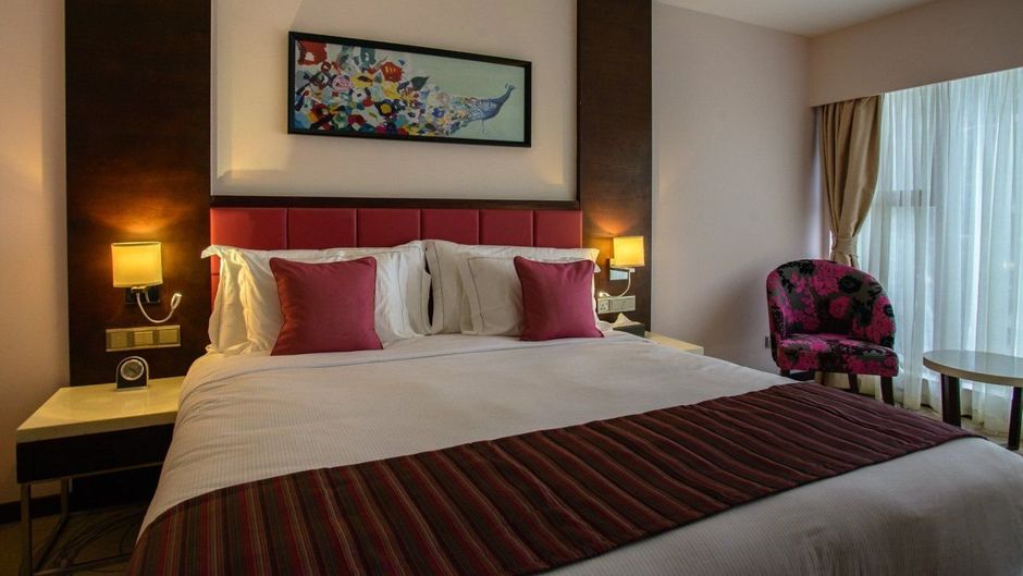 The Concord Hotel & Suites Room