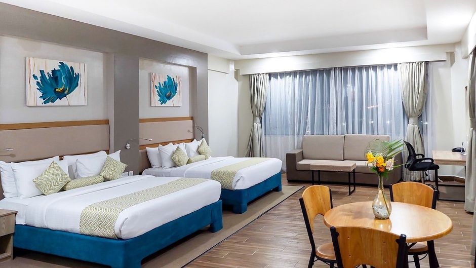 PrideInn Plaza Hotel & Conference Center Room