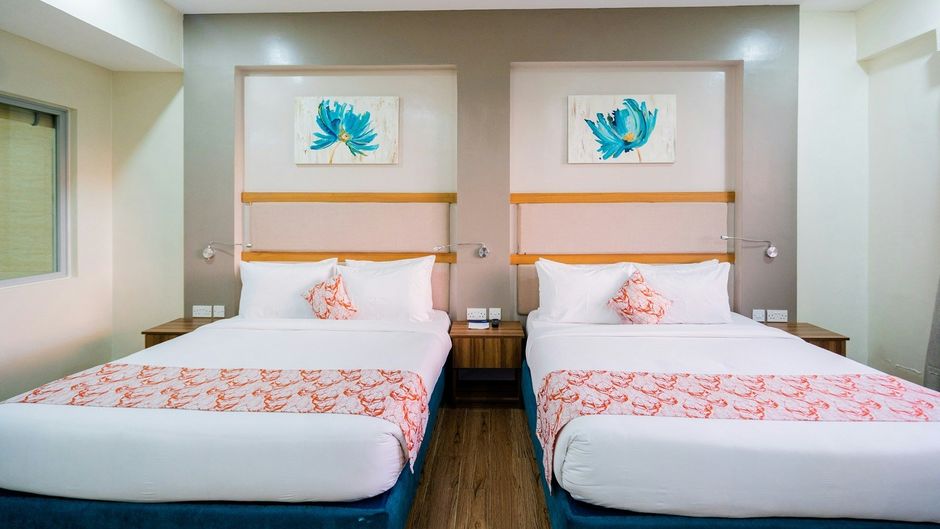 PrideInn Plaza Hotel & Conference Center Room