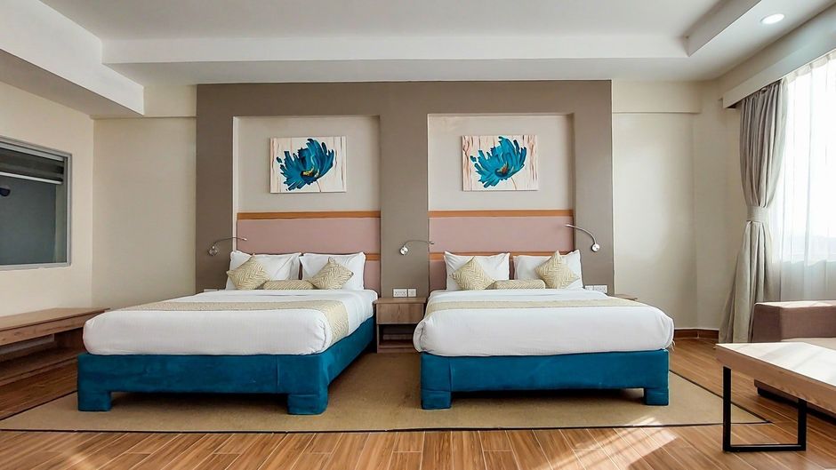 PrideInn Plaza Hotel & Conference Center Room
