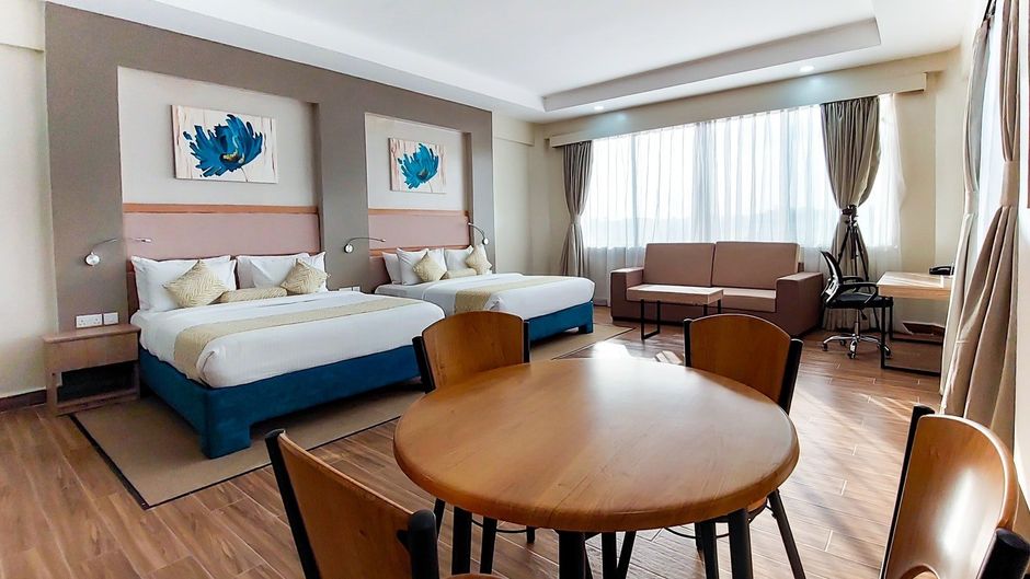 PrideInn Plaza Hotel & Conference Center Room