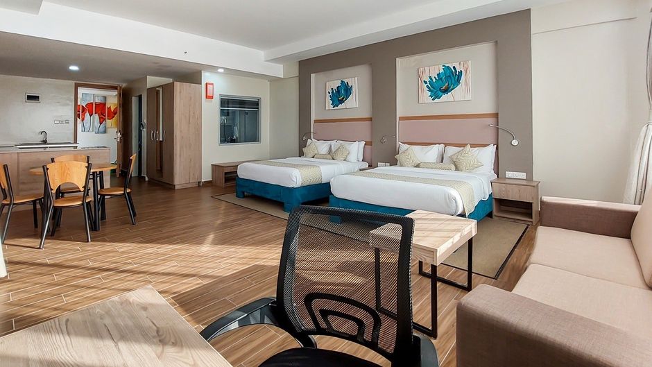 PrideInn Plaza Hotel & Conference Center Room