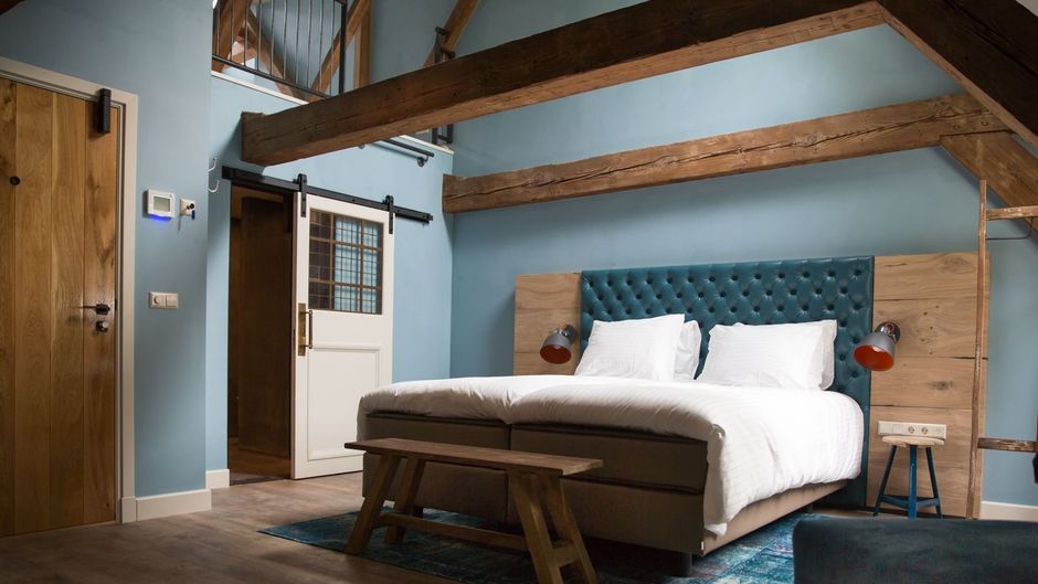 Van Rossum City Hotel Room
