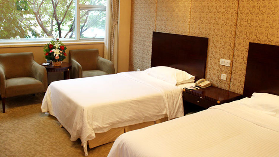 New Era Hotel Room