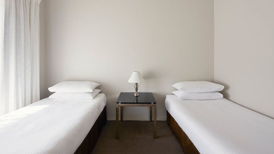 Pinnacle Apartments Room